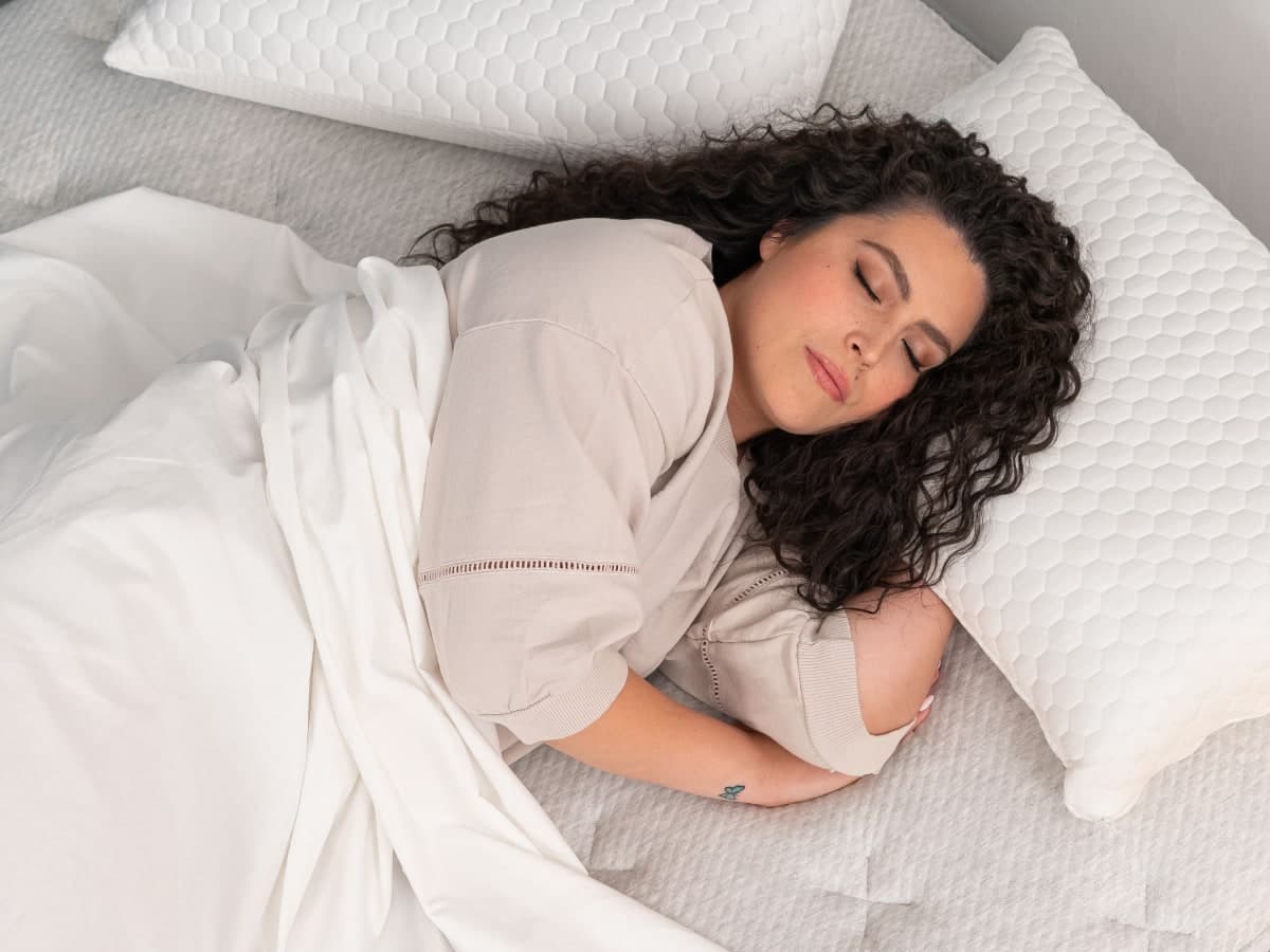 A woman getting some rest on her Leesa