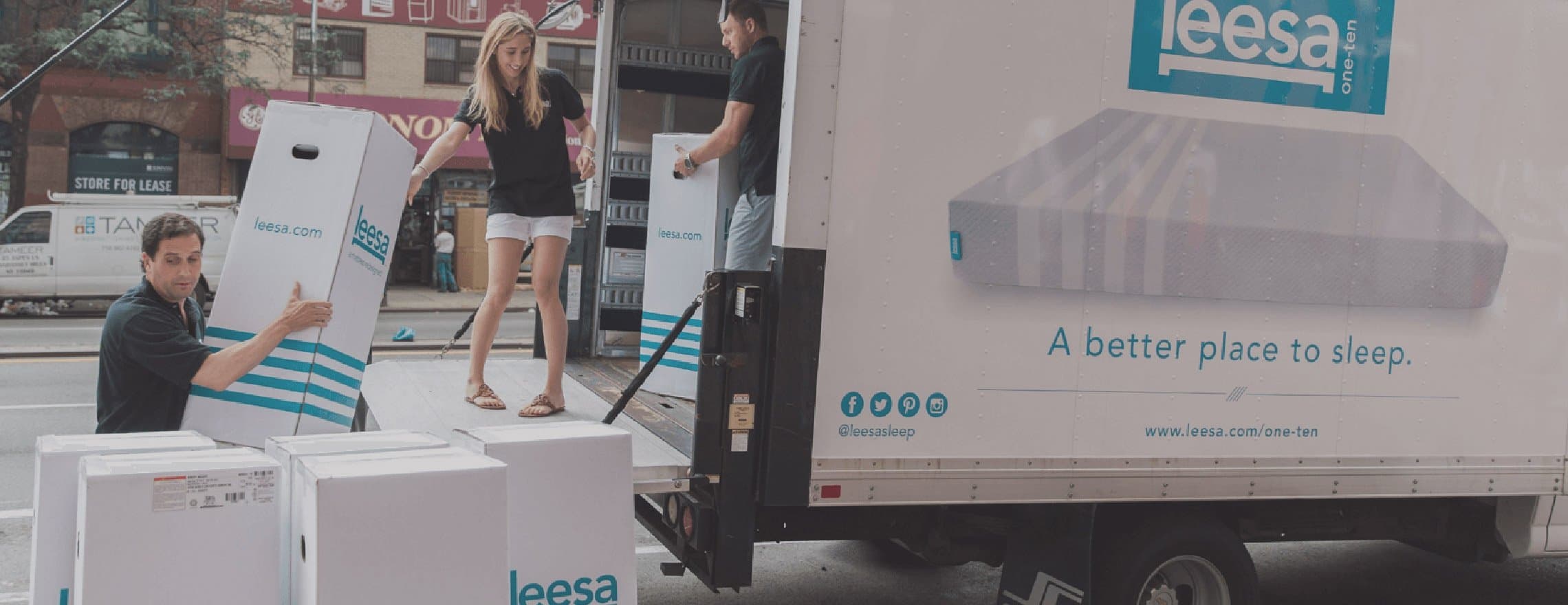 leesa_staff_unloading_a_leesa_truck.jpg