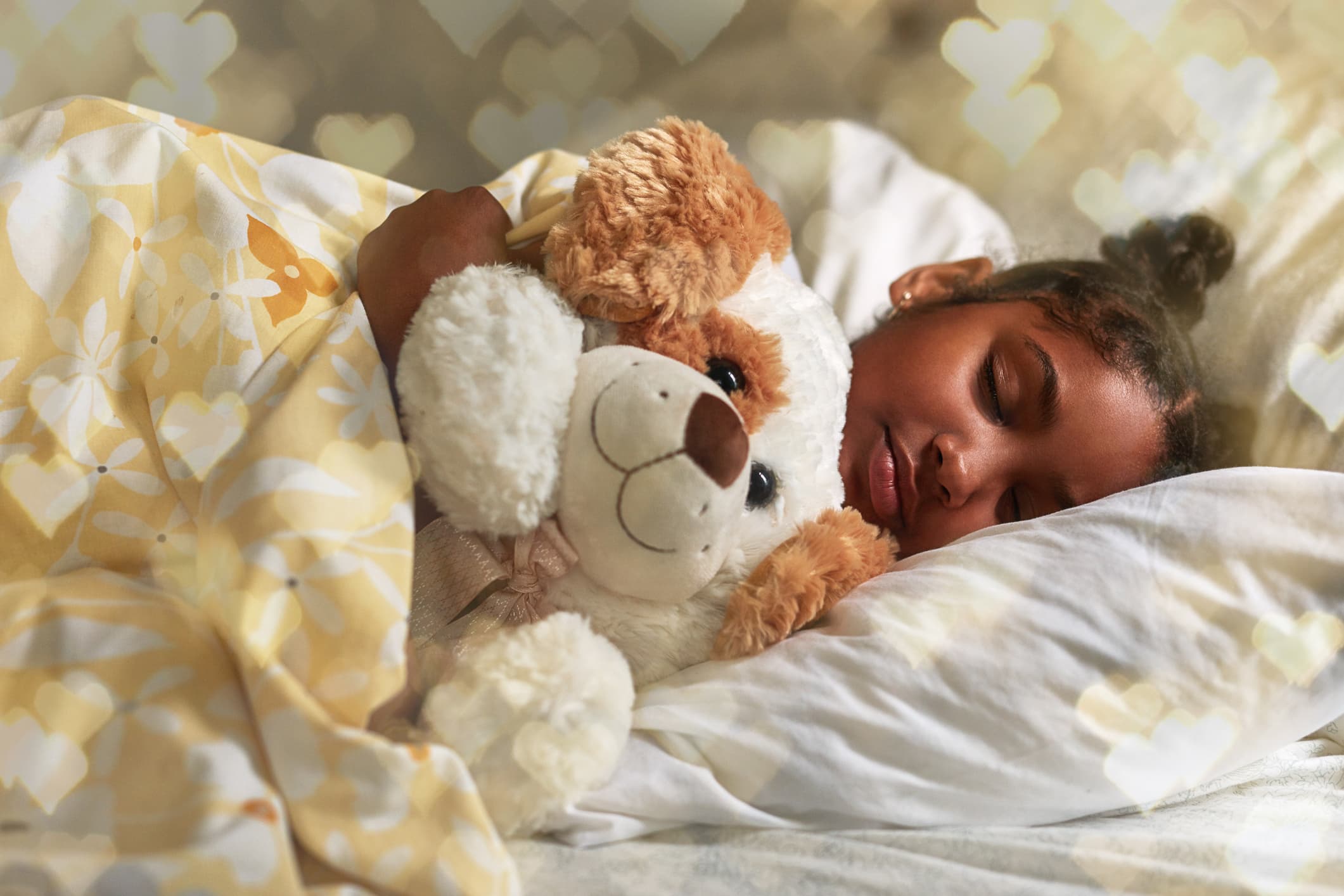 Kid sleeping in her Leesa bed