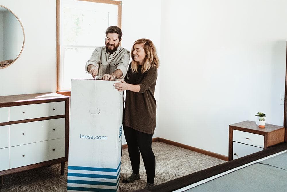 financing couple opening box