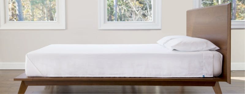cozy_bed_leesa_mattress_on_a_wooden_frame_side_view