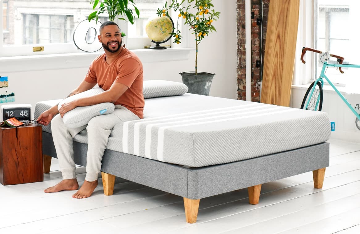 man_sitting_on_leesa_mattress_platform_1